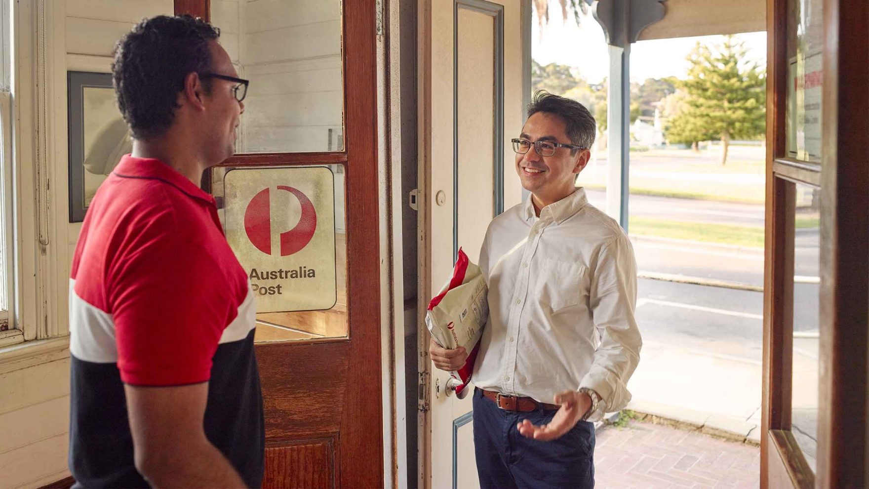 photo-two-men-standing-in-post-office-doorway-1.jpg.auspostimage.1760_0.medium-1.jpg